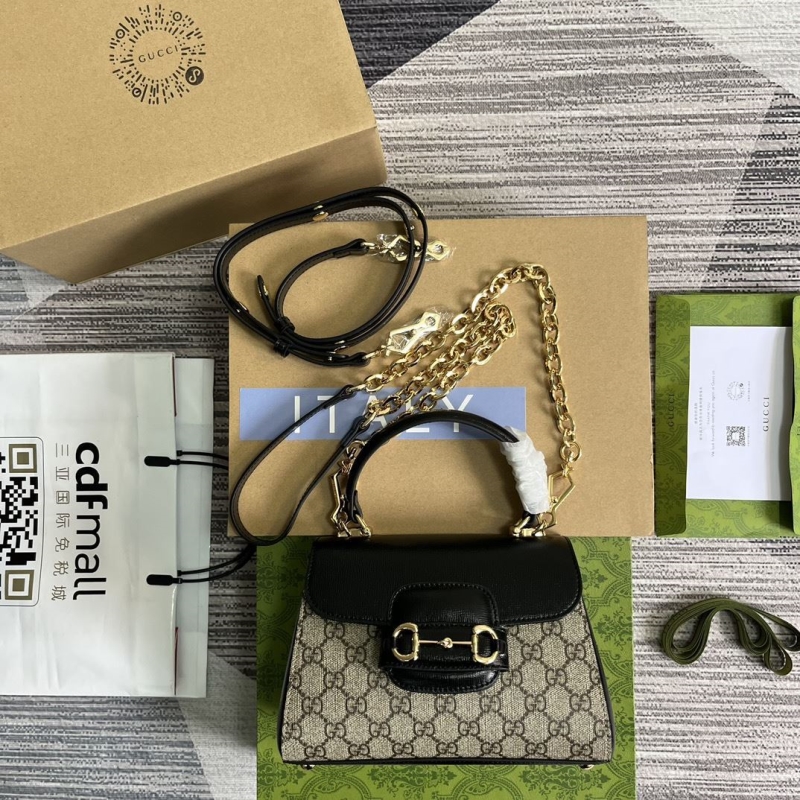 G*u*i top handle bags
